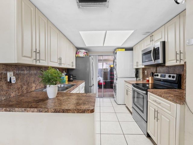 Home for sale at 3056 NW 15th St 201 - photo 7493637