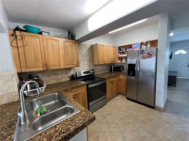 Home for rent at 1885 NE 53rd St - photo 7384250