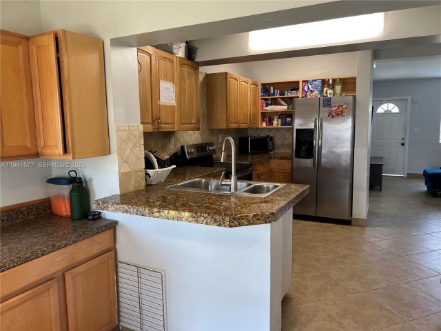 Home for rent at 1885 NE 53rd St - photo 7384252