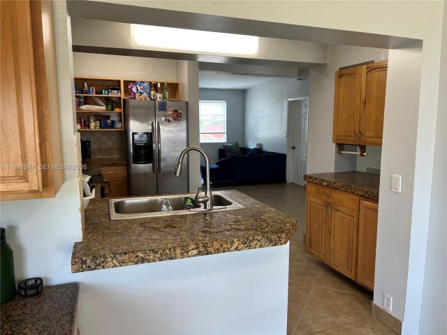 Home for rent at 1885 NE 53rd St - photo 7384253