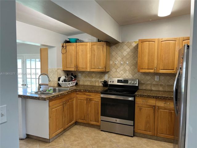 Home for rent at 1885 NE 53rd St - photo 7384254