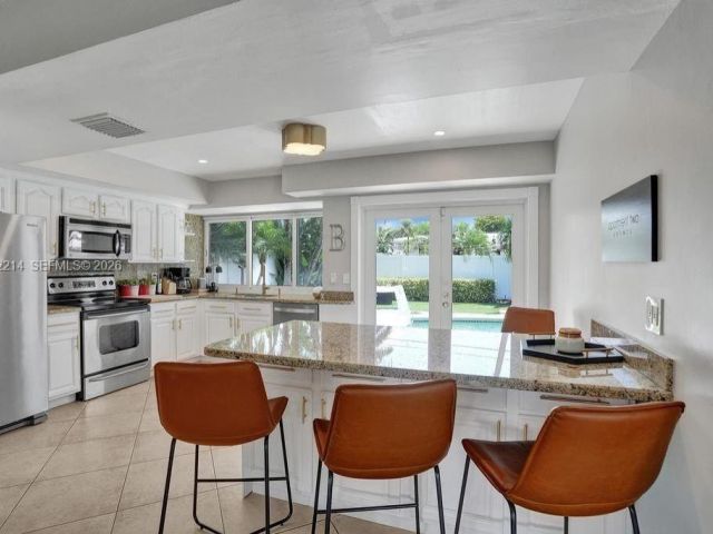 Home for rent at 2080 NE 65th St - photo 7531576