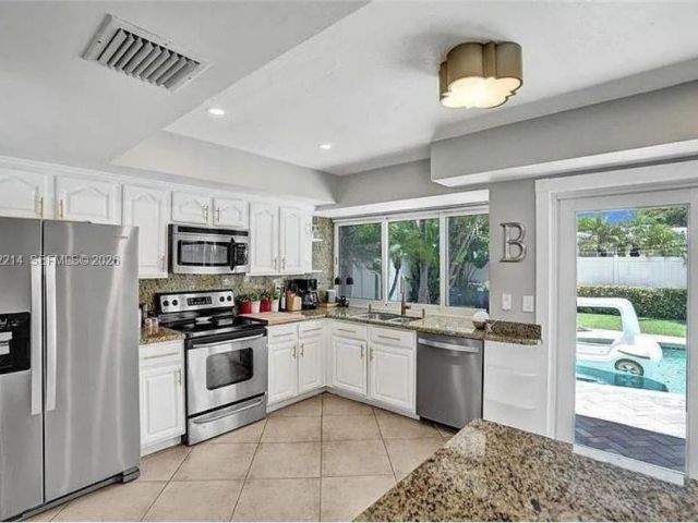 Home for rent at 2080 NE 65th St - photo 7531577