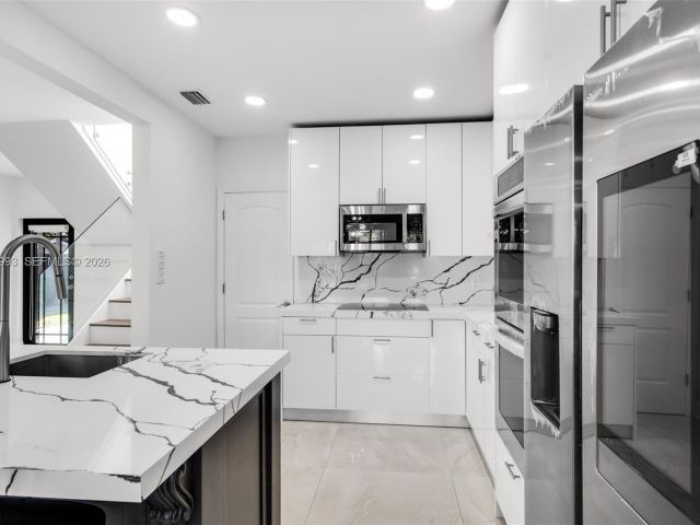 Home for sale at 66 NW 73rd Place - photo 7514907