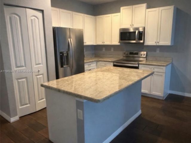 Home for rent at 1040 NW 33rd Ct 1040 - photo 7504360