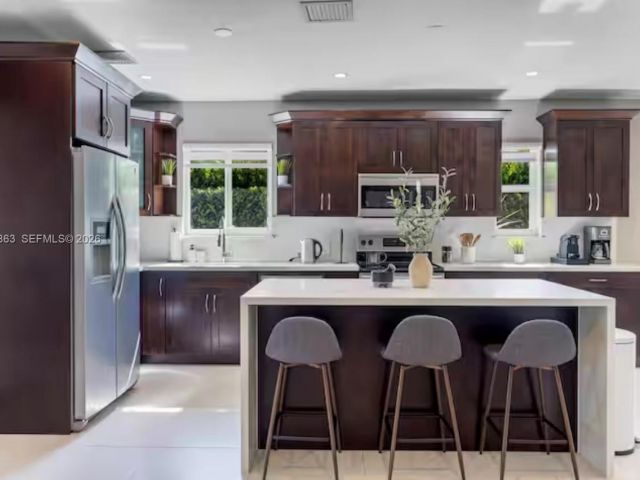 Home for rent at 1019 NE 115th St 1019 - photo 7401135