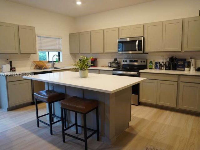 Home for rent at 385 NW 9th St 385 - photo 7420805