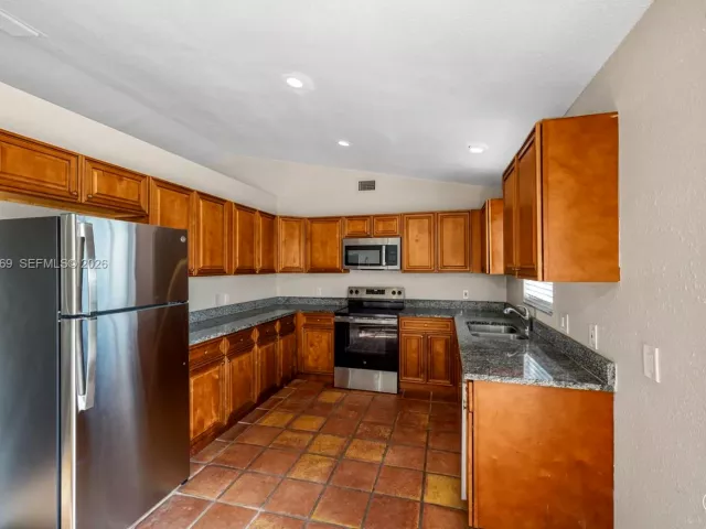 3-bedroom home for sale in West Palm Beach - 13010 60th St N - MondialRealty