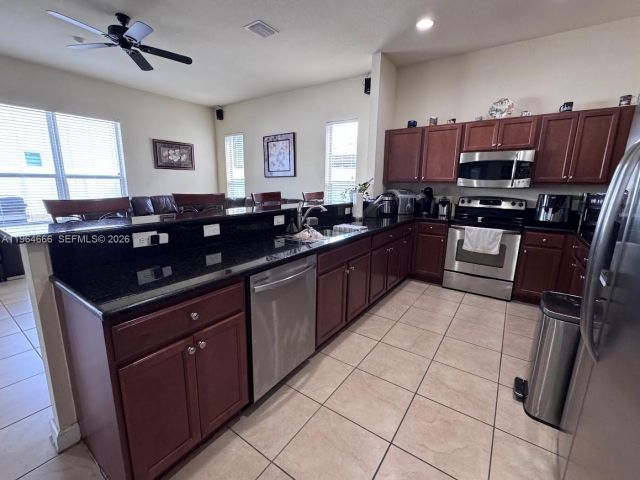 Home for rent at 9165 SW 170th Ave . - photo 7428458