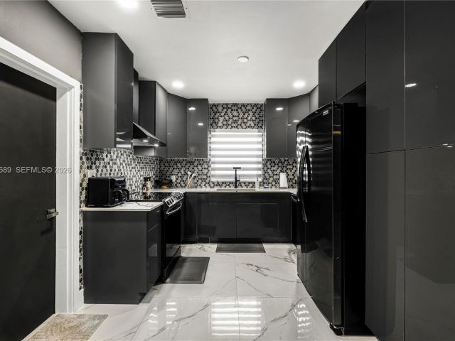 Home for sale at 285 NW 45th St - photo 7427991