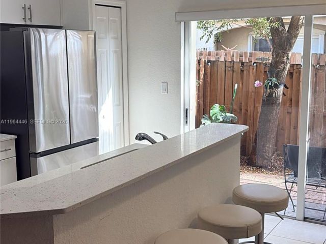 Home for rent at 10776 NW 84th Ln 8-30 - photo 7485485