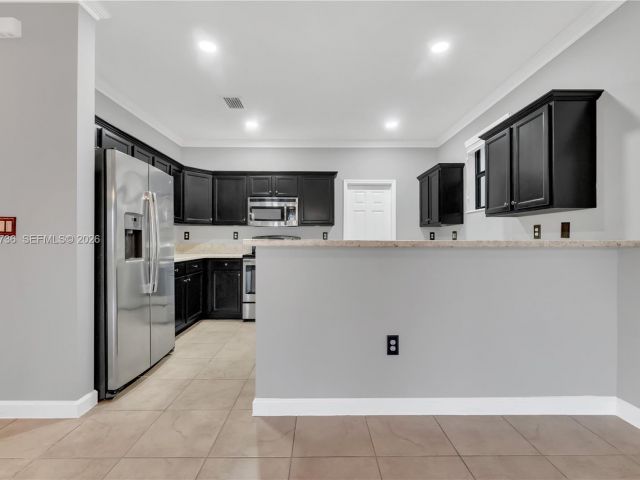 Home for rent at 3401 SE 5th St 3401 - photo 7432711