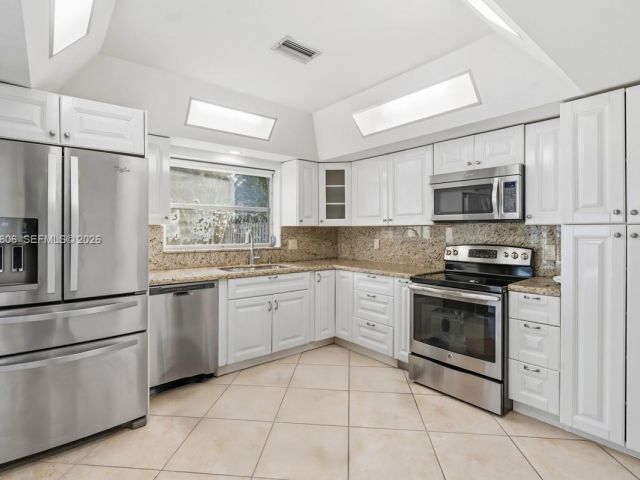 Home for rent at 1260 SW 8th St - photo 7444779