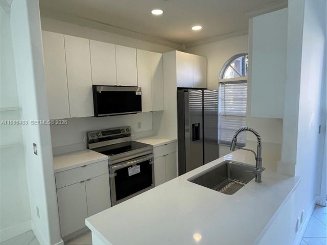 Home for rent at 703 NE 195th St 703 - photo 7438148