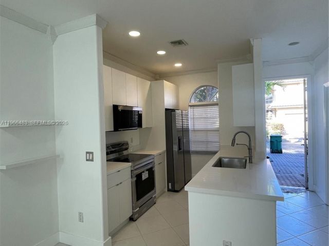 Home for rent at 703 NE 195th St 703 - photo 7438149