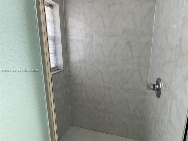 Home for rent at 703 NE 195th St 703 - photo 7438159