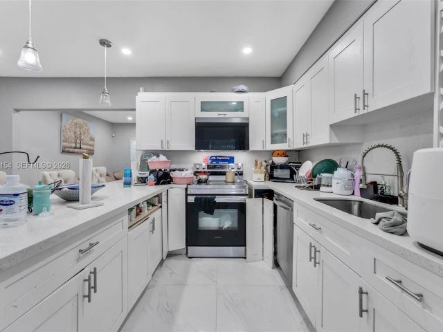 Home for sale at 860 NE 142nd St - photo 7442972