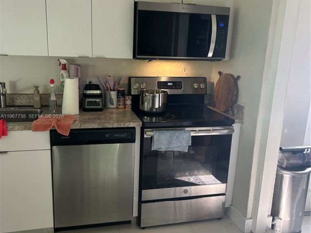 Home for rent at 1560 NE 129th St - photo 7475728