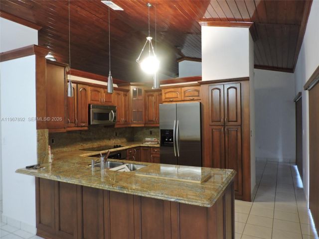 Home for rent at 10753 SW 142nd Ct 0 - photo 7449424