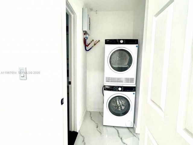 Home for rent at 1409 NE 151st Ter 1409 - photo 7480926