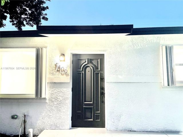 Home for rent at 1409 NE 151st Ter 1409 - photo 7480950