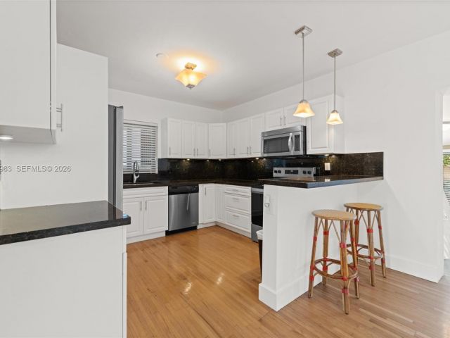 Home for rent at 710 NE 62nd St - photo 7449136