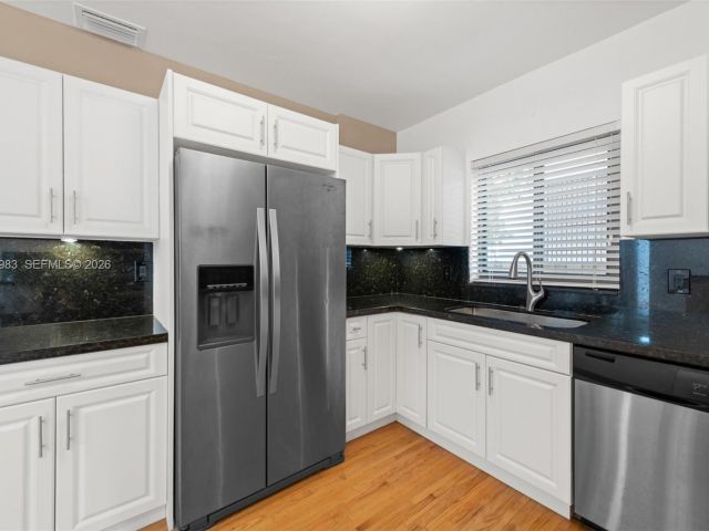 Home for rent at 710 NE 62nd St - photo 7449137