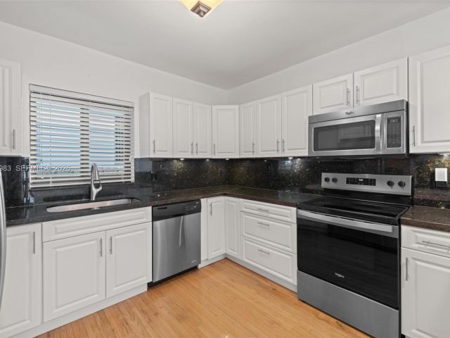 Home for rent at 710 NE 62nd St - photo 7449150