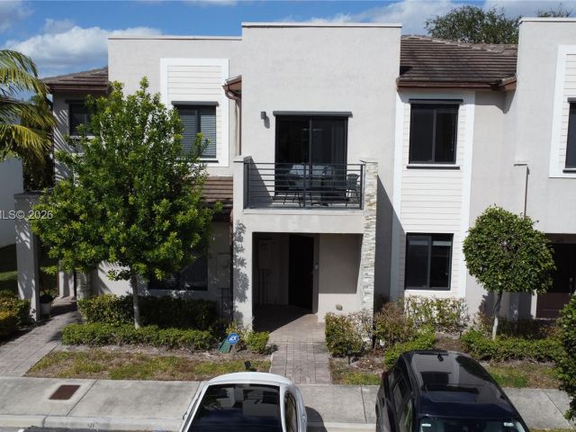 Home for rent at 323 NE 208th Ter 0 - photo 7449379