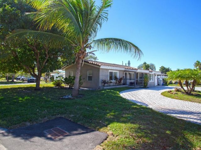 Home for sale at 2450 NE 18th St - photo 7515527