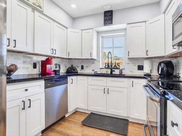 Home for sale at 2450 NE 18th St - photo 7515540