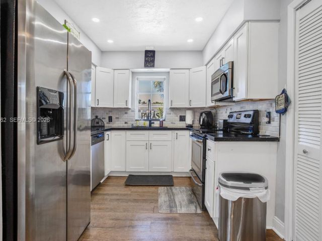 Home for sale at 2450 NE 18th St - photo 7515542