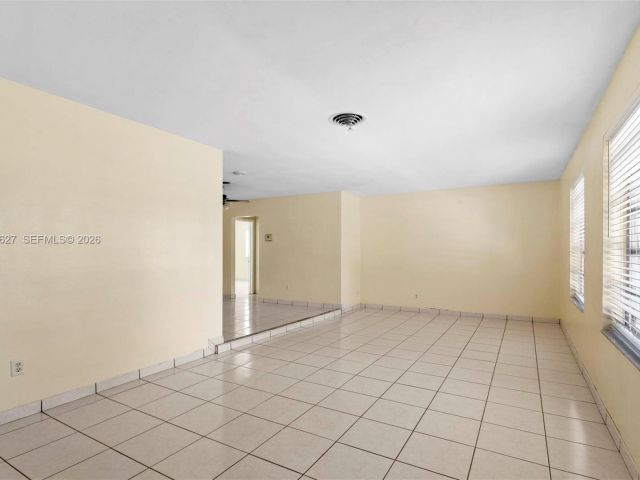 Home for rent at 12905 NE 4th Ave 1 - photo 7475638