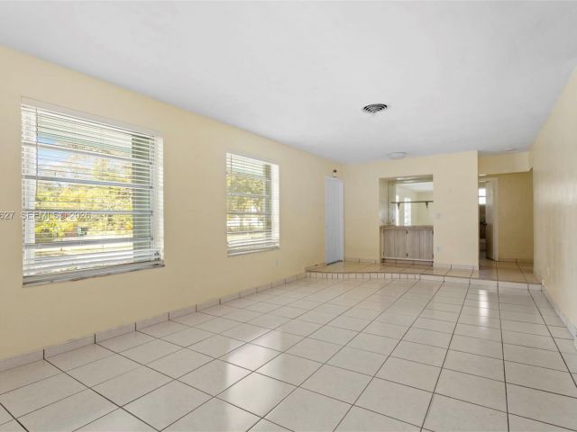 Home for rent at 12905 NE 4th Ave 1 - photo 7475639