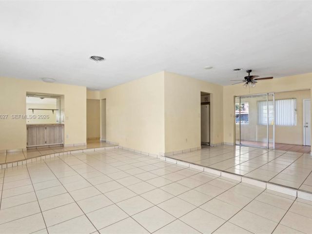 Home for rent at 12905 NE 4th Ave 1 - photo 7475640