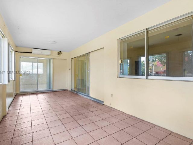 Home for rent at 12905 NE 4th Ave 1 - photo 7475645