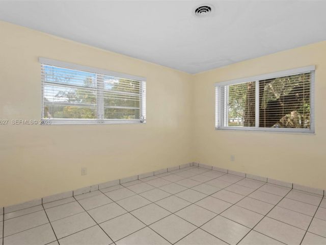 Home for rent at 12905 NE 4th Ave 1 - photo 7475646