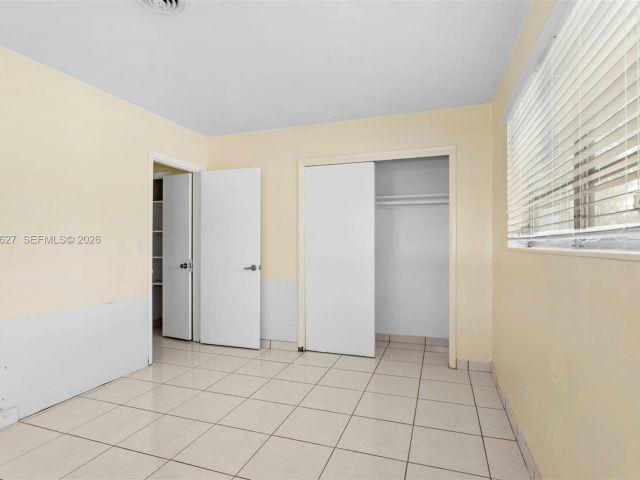 Home for rent at 12905 NE 4th Ave 1 - photo 7475647