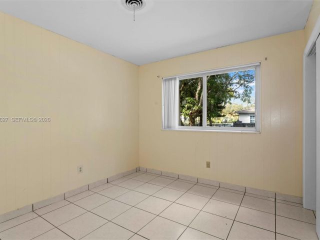 Home for rent at 12905 NE 4th Ave 1 - photo 7475649