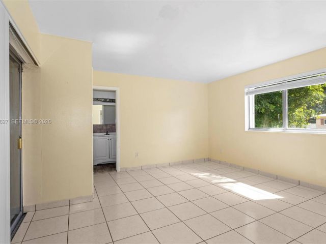 Home for rent at 12905 NE 4th Ave 1 - photo 7475652