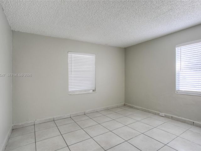 Home for rent at 3001 NW 102nd St - photo 7466078