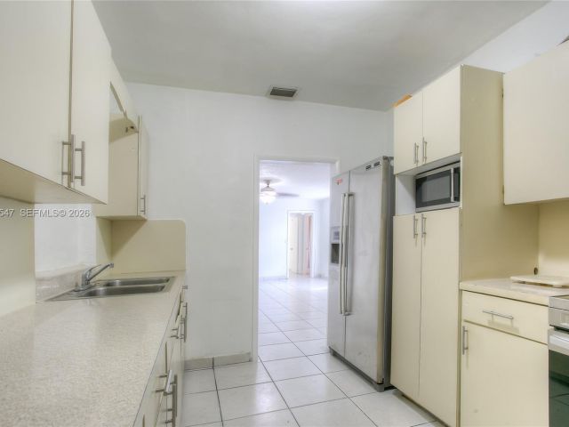 Home for rent at 3001 NW 102nd St - photo 7466081