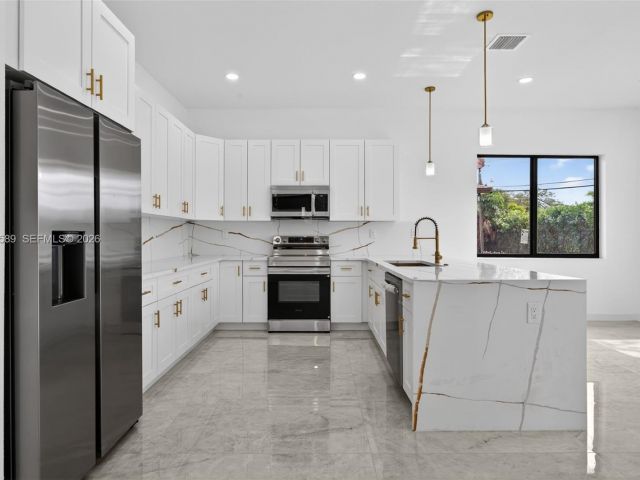 Home for sale at 3050 NW 24th St - photo 7482478