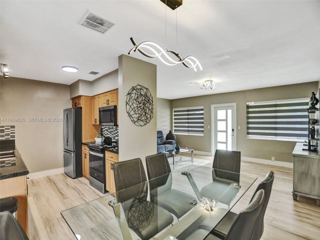 Home for rent at 491 SE 23rd Ave 1 - photo 7531094