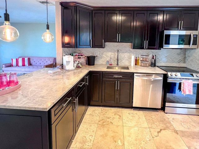 Home for sale at 1130 NE 23rd Pl - photo 7478827