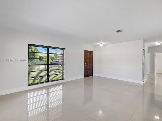 Home for rent at 3840 NW 176th St 1 - photo 7480417