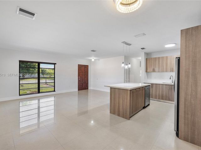 Home for rent at 3840 NW 176th St 1 - photo 7480421