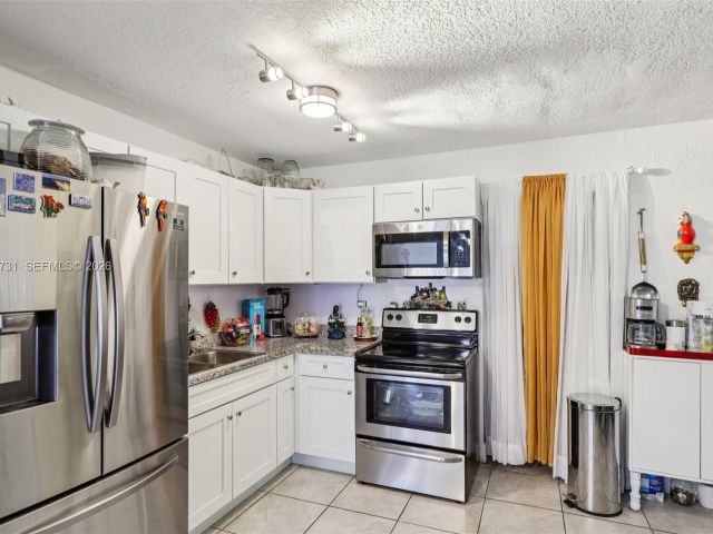 Home for sale at 6402 NW 8th Ave - photo 7464362