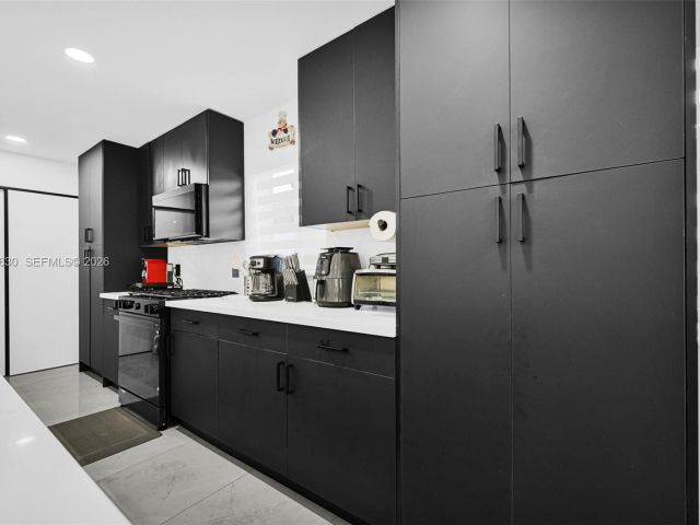 Home for sale at 4430 NW 23rd Ave - photo 7463941