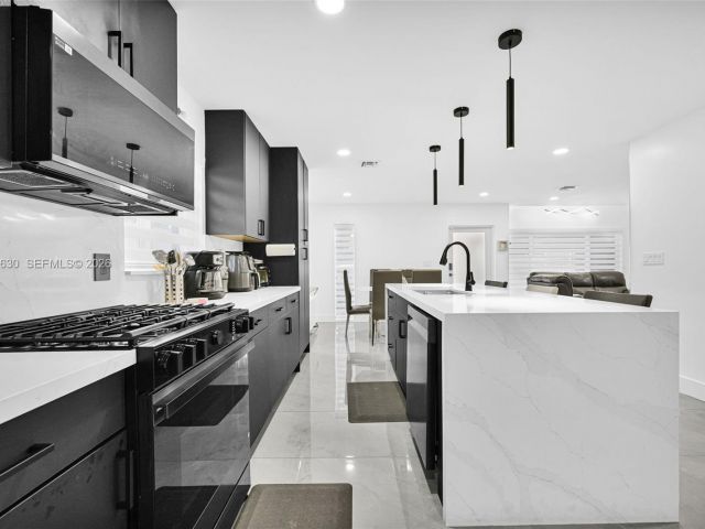 Home for sale at 4430 NW 23rd Ave - photo 7463945